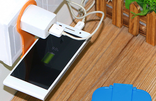 Stand for charging smartphones